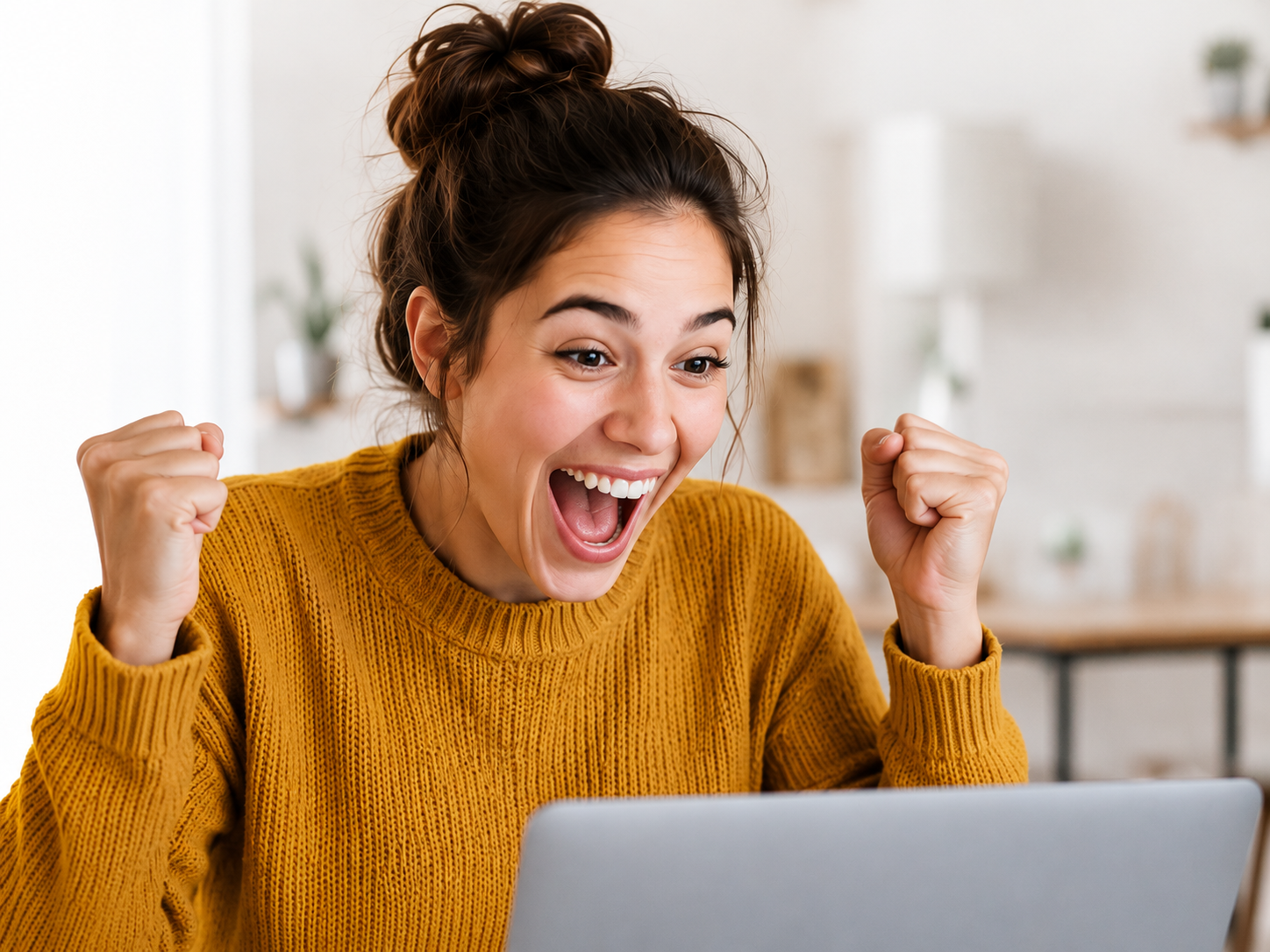 Excited woman in yellow sweater reacting with joy at laptop screen showing AI job matches